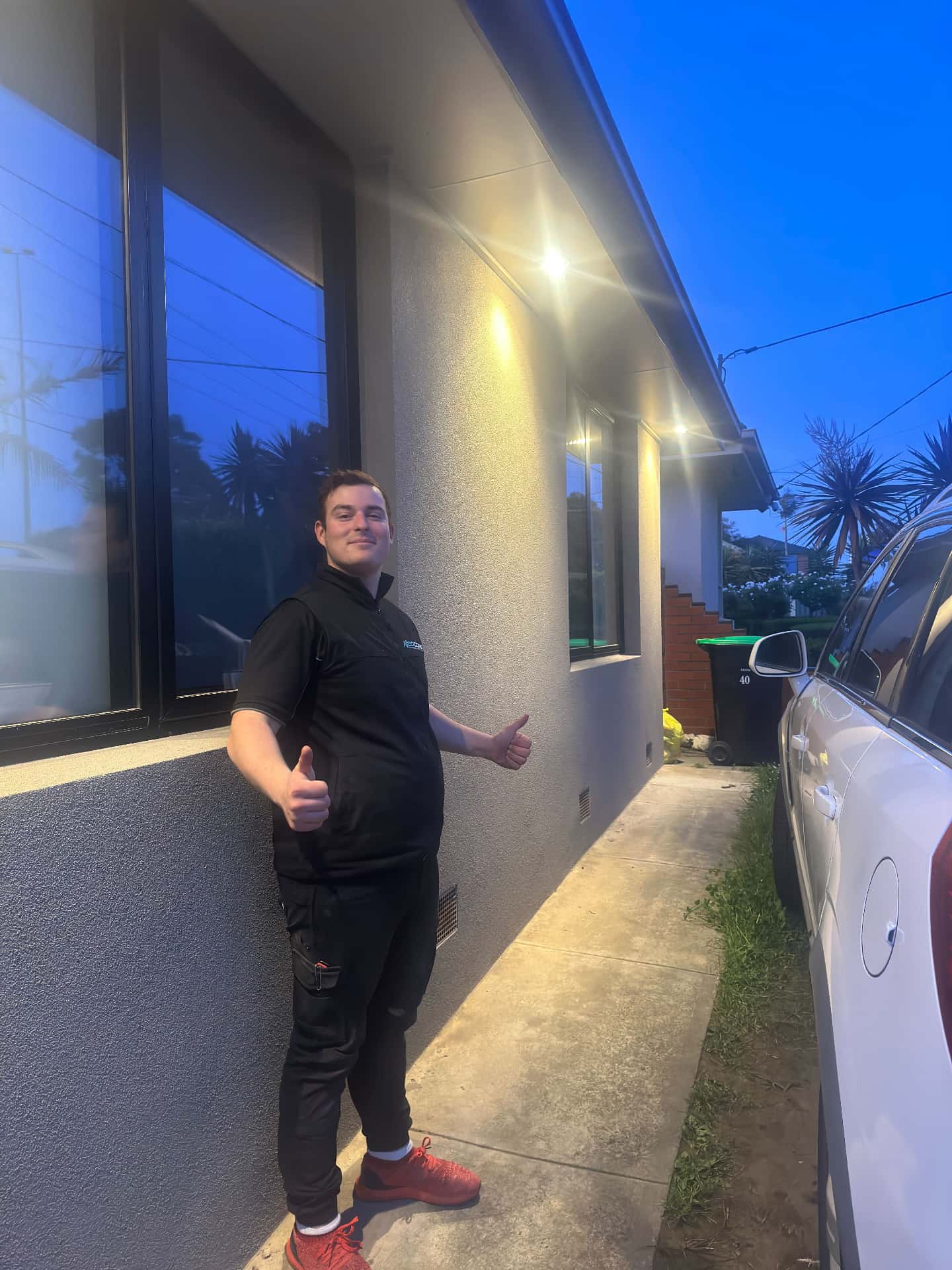 Neocore electrician working on an outdoor lighting installation in Melbourne's south-east