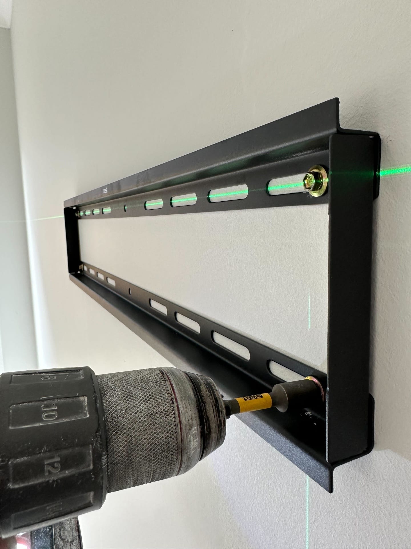 Precision bracket and mount installation by a Clayton South electrical contractor