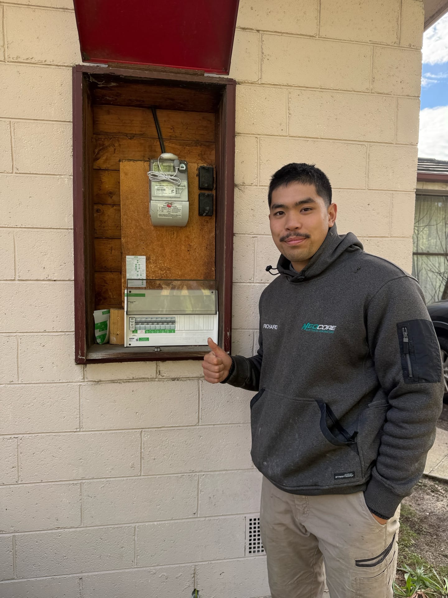 Neocore electrician Richard after completing a switchboard service in Melbourne