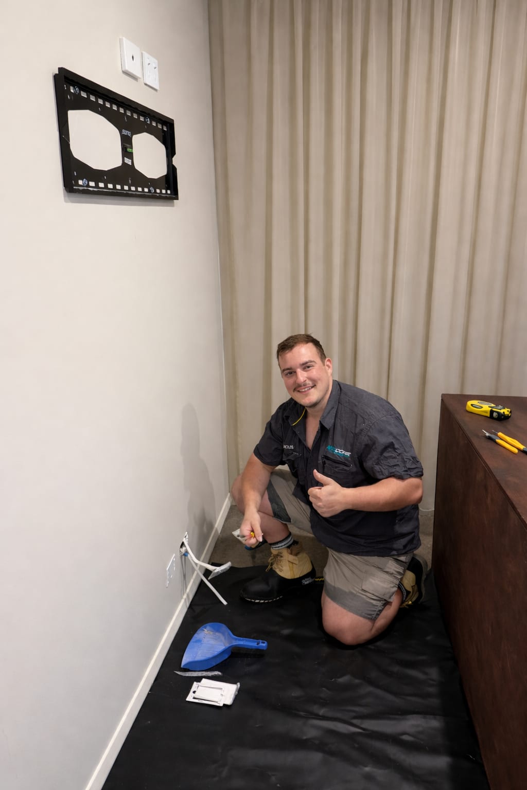 TV wall mount installation by a Neocore electrician in Clayton South